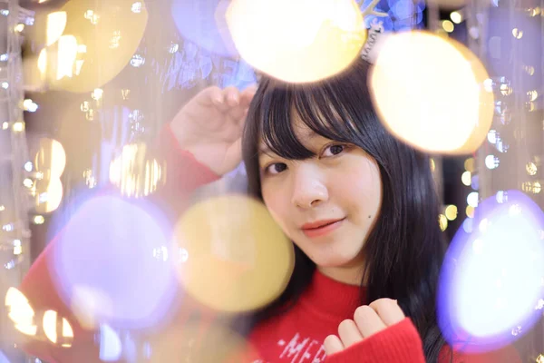 Beautiful Asian Young Woman Red Sweater Christmas Tree Light — Stock Photo, Image