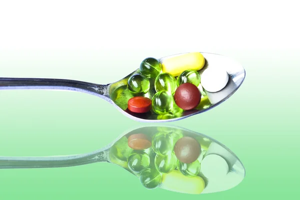 Silver Spoon with Pills — Stock Photo, Image