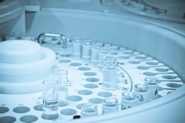 Chromatograph with glass sample bottles — Stock Photo, Image