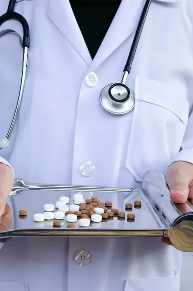 Doctor giving you medical pill — Stock Photo, Image