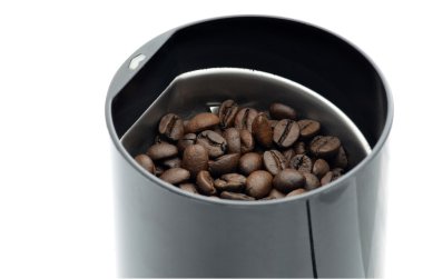 Coffee grinder with coffee grains