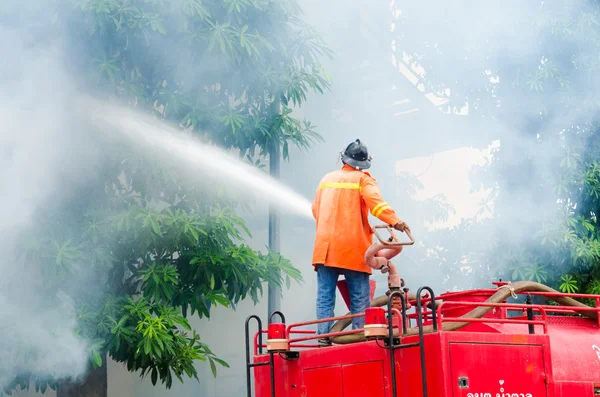 Practicing fire protection plan — Stock Photo, Image