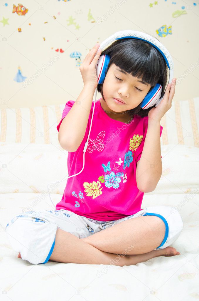 Girl listens the music.