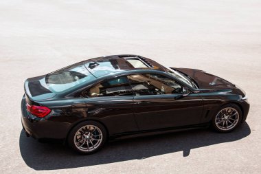 Kiev, Ukraine - June 19, 2021: Black BMW car on the road