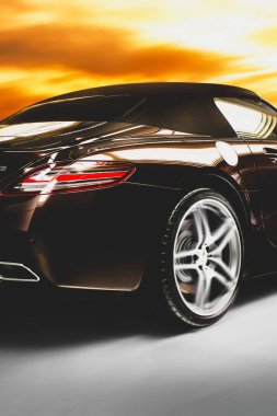 Kiev, Ukrayna - 2 Haziran 2012: Lüks Alman süper araba Mercedes-Benz SLS AMG Roadster güzel bir gökyüzünün arka planına karşı. Araba yüksek hızda. Araba hareket halinde