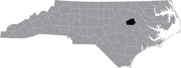 ノースカロライナ州の灰色の行政地図の中のウィルソン郡の黒いハイライト表示された場所 — ストックベクタ