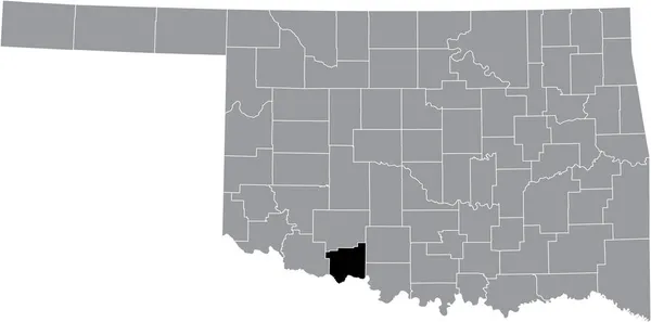オクラホマ州の灰色の行政地図の中のコットン郡の黒いハイライトされた場所 — ストックベクタ