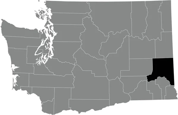 米国ワシントン州の灰色の行政地図の中のホイットマン郡の黒いハイライトされた場所の地図 — ストックベクタ
