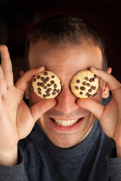 Man with Cookie Eyes — Stock Photo, Image