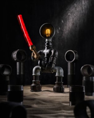 Robot tesisatçı, dökme demir metal teçhizatından. Bileşen su tedarik sistemi, boru hattı sistemi. Kavram