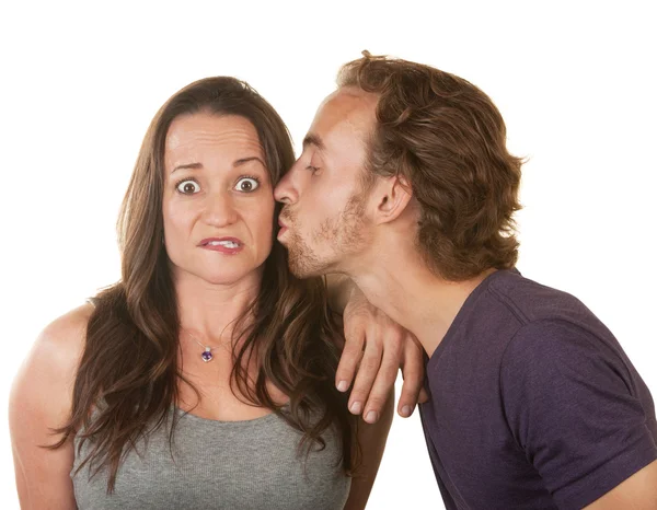 Man Kissing Surprised Woman — Stock Photo, Image