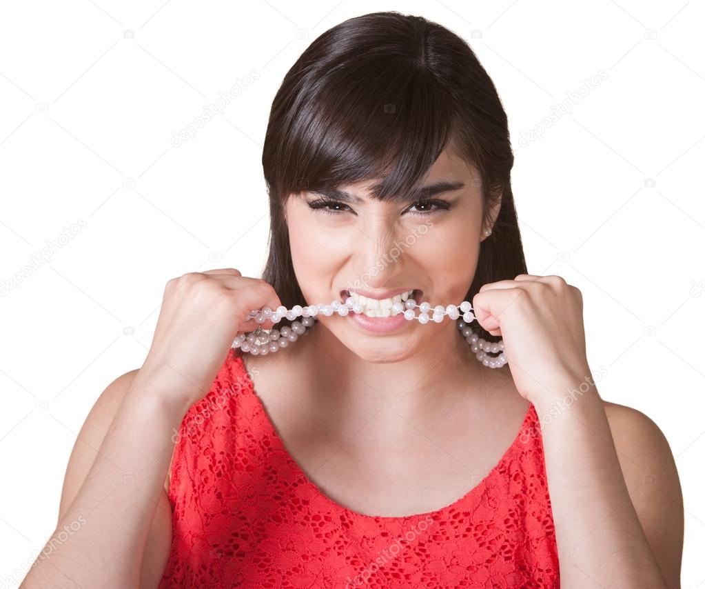 Frustrated Woman Chewing on Necklace