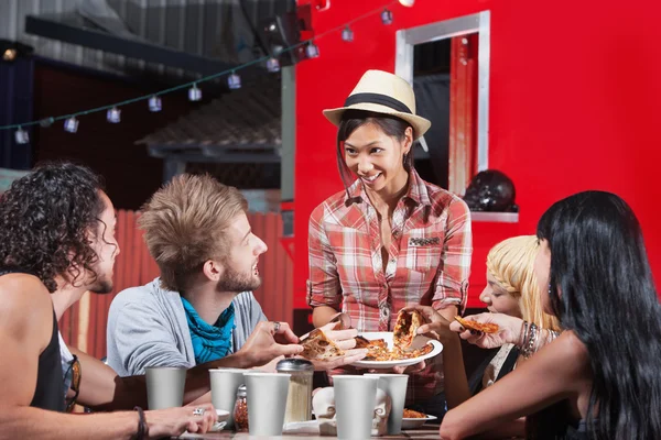 Friend Sharing Slices of Pizza — Stock Photo, Image