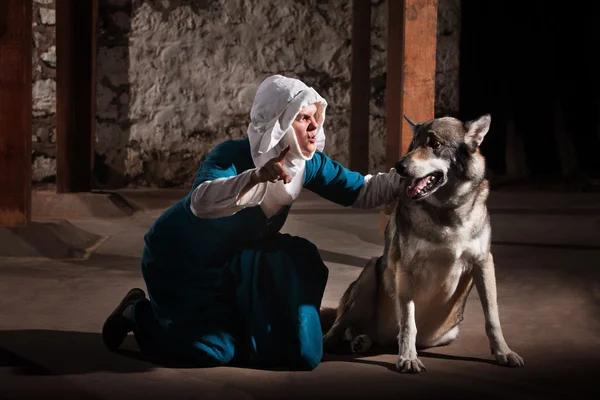 Nun Commanding Dog — Stock Photo, Image