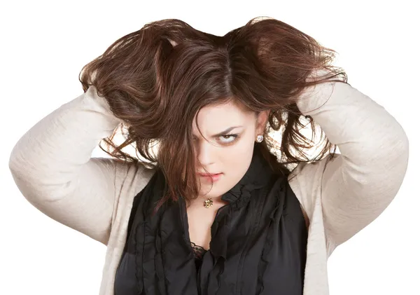 Mujer sosteniendo el cabello desordenado — Foto de Stock