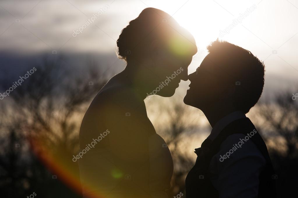 Back Lit Loving Couple