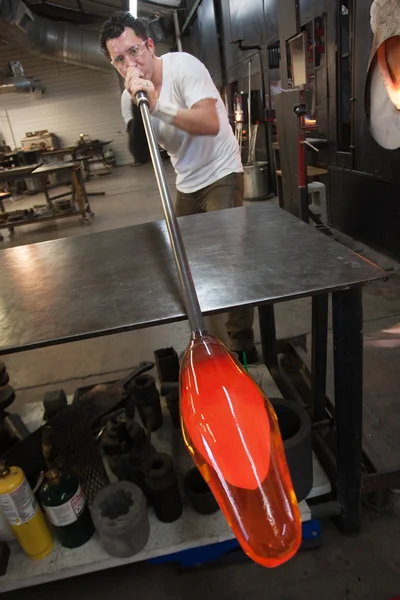 Man Blowing into Glass Object — Stock Photo, Image