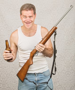 Man with Rifle and Beer clipart