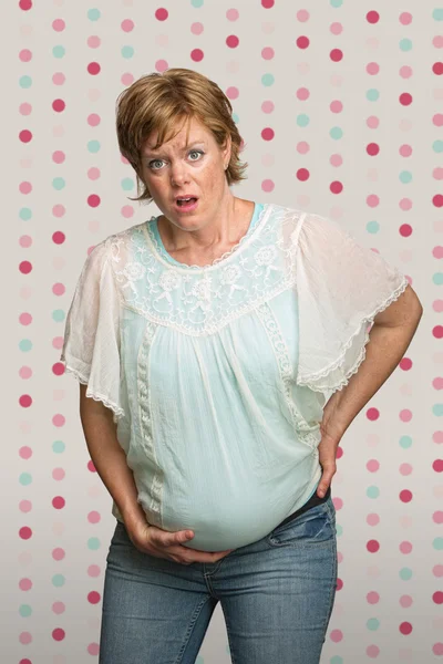 Embarazada dama tener contracciones —  Fotos de Stock