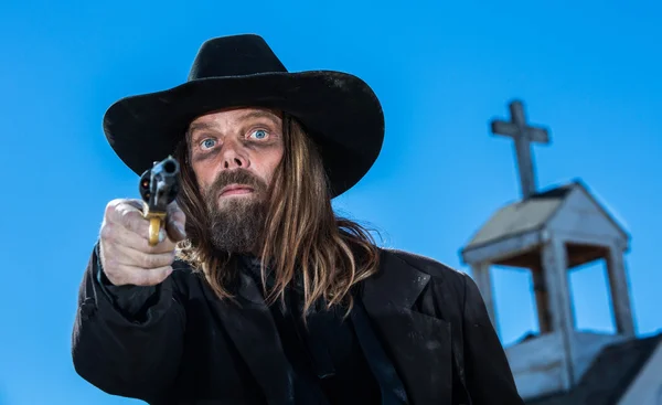 Man Holds Gun — Stock Photo, Image