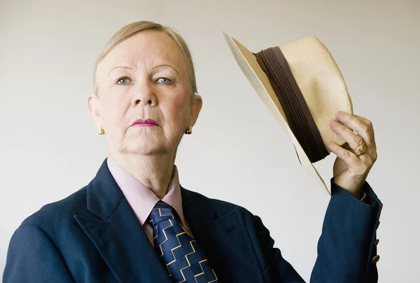 Dramatic Senior Woman with a Hat — Stock Photo, Image