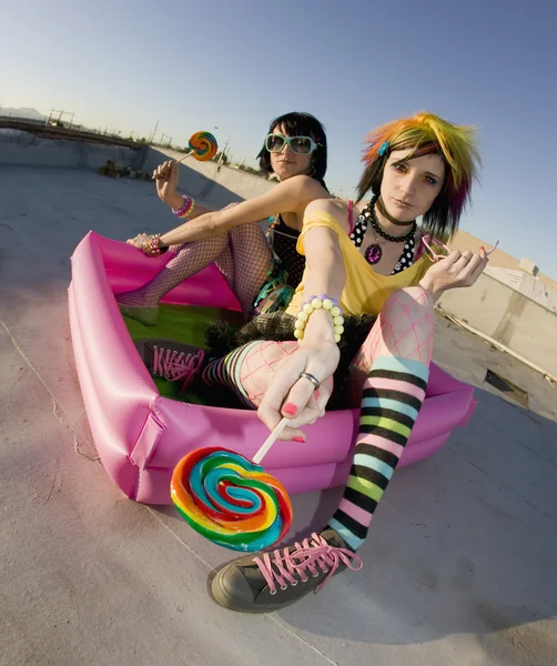 Girsl on a roof in a plastic pool — Stock Photo, Image