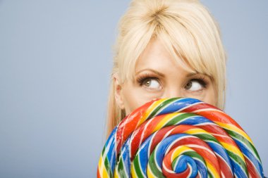Woman with a lollipop clipart
