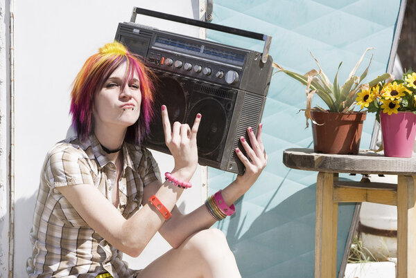 Girl Sitting on a Trailer Step