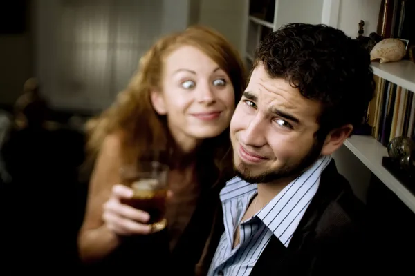 Woman Leers at Man at Party — Stock Photo, Image