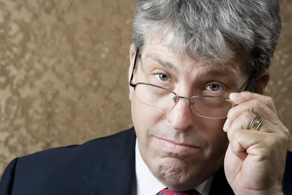 Businessman Lokking Over His Glasses — Stock Photo, Image