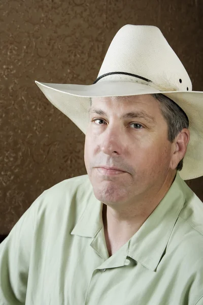 Homme dans un chapeau de cow-boy — Photo