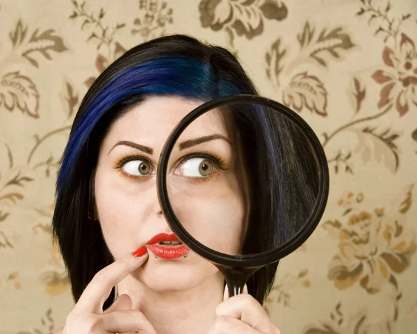 Pretty Woman with a Magnifying Glass — Stock Photo, Image