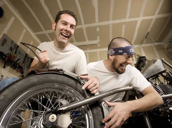 Laughing Motorcycle Mechanics — Stock Photo, Image