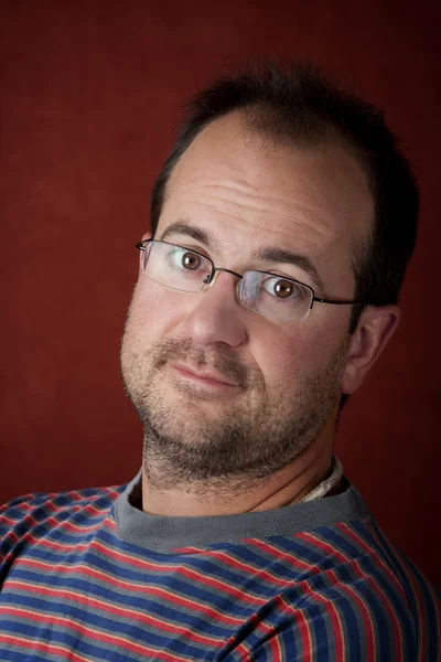 Rugged young man wearing glasses — Stock Photo, Image