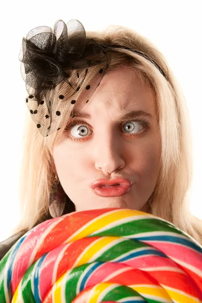 Pretty young woman with lollipop — Stock Photo, Image