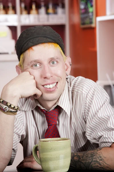 Hipster en una cafetería —  Fotos de Stock