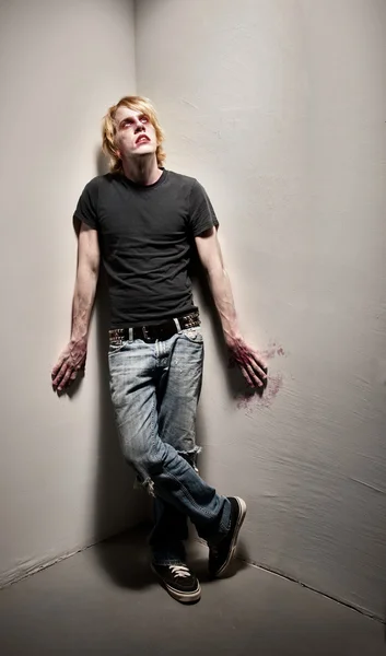 Zombie or vampire in a corner — Stock Photo, Image