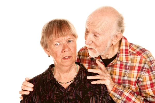 Senior man sharing information with concerned wife — Stock Photo, Image