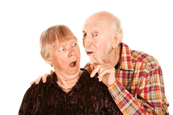 Man talking to shocked wife — Stock Photo, Image