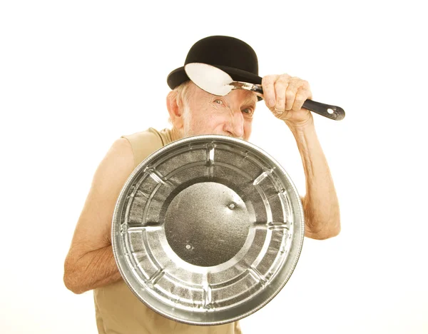 Crazy man defending himself with can lid and spoon — Stock Photo, Image