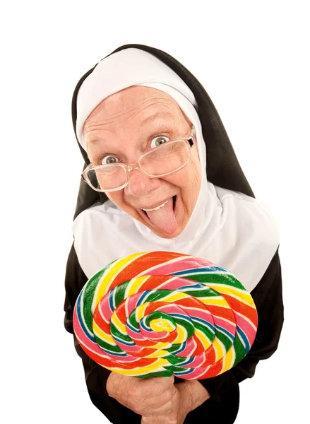 Śmieszne zakonnica z lizak — Zdjęcie stockowe