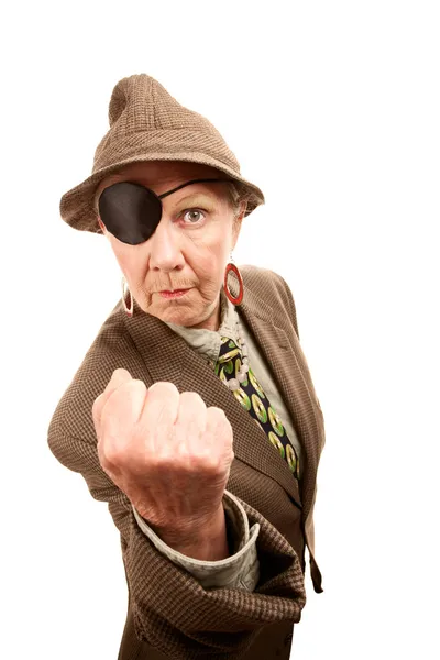 Senior woman in male clothing and eyepatch — Stock Photo, Image