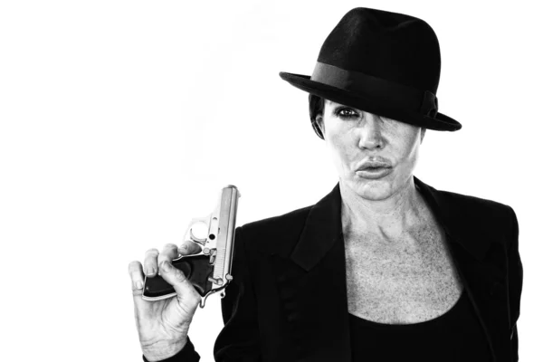 Woman with smoking gun — Stock Photo, Image