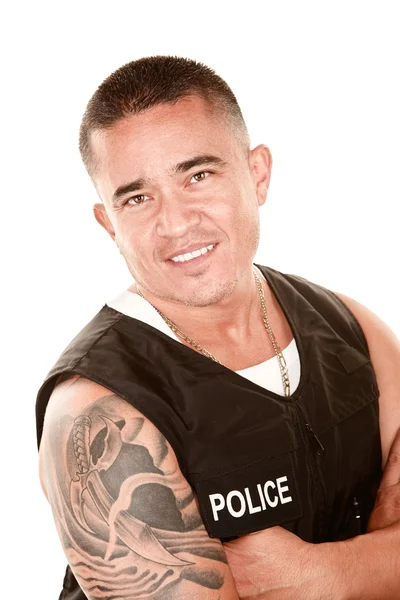 Knappe hispanic cop — Stockfoto