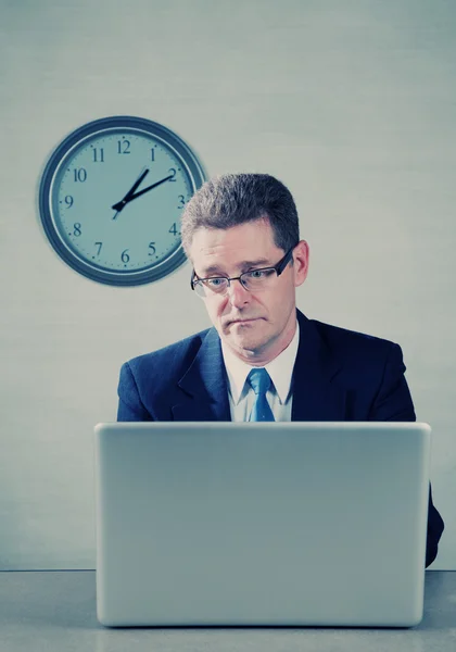 Bored man on laptop computer — Stock Photo, Image