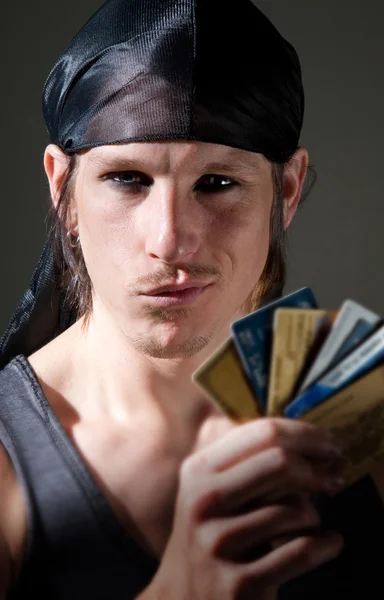 Thief with credit cards — Stock Photo, Image