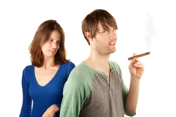 Woman reacts to man with cigar — Stock Photo, Image
