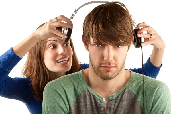 Mulher interupts homem com fones de ouvido — Fotografia de Stock