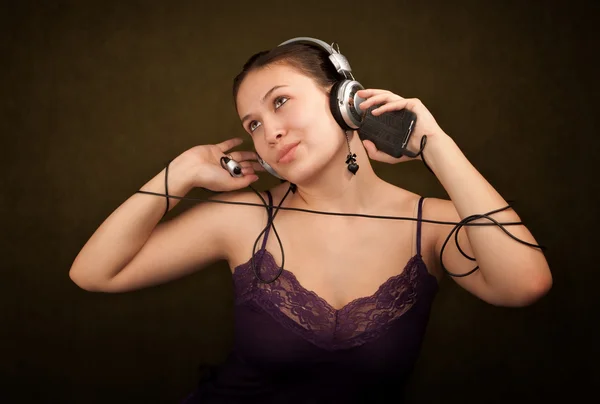 Girl with audio device — Stock Photo, Image