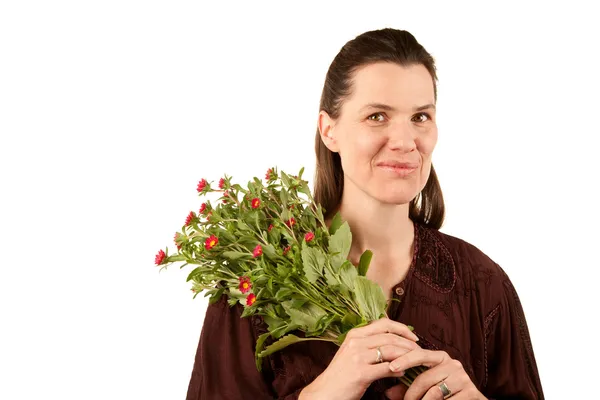 Mujer bastante adulta con flores —  Fotos de Stock